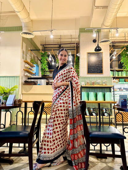 Cream & Rust Elephant Print Mul Cotton Saree